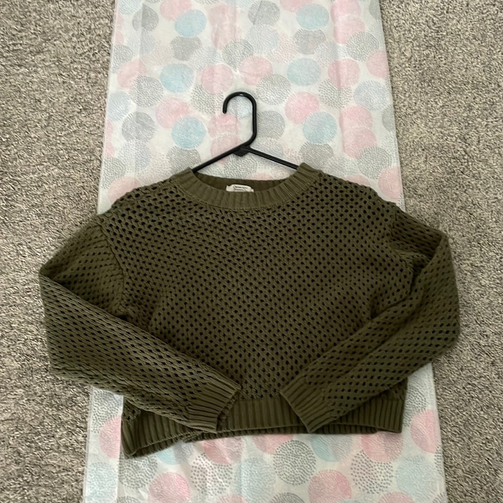 Green shrug cropped oversized see through sweater.